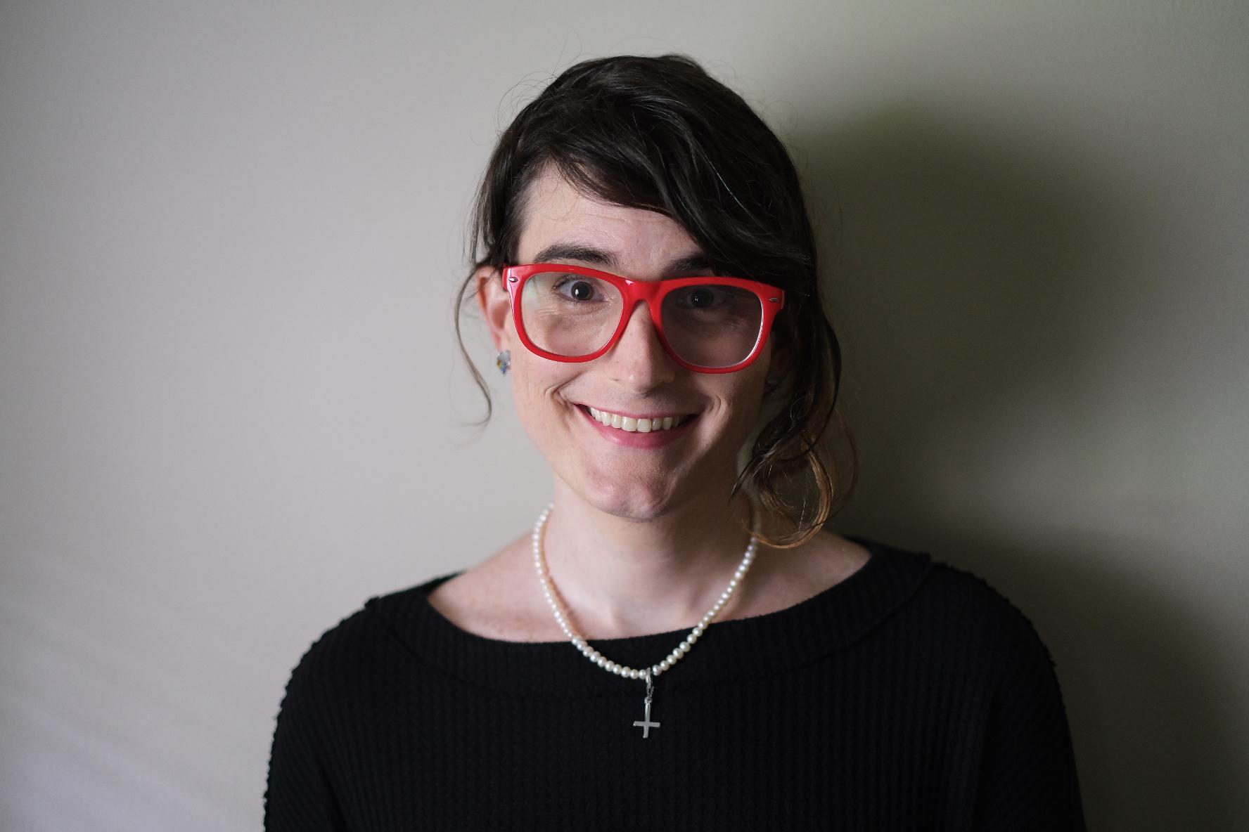 Jocelyn Smith sitting by her desk